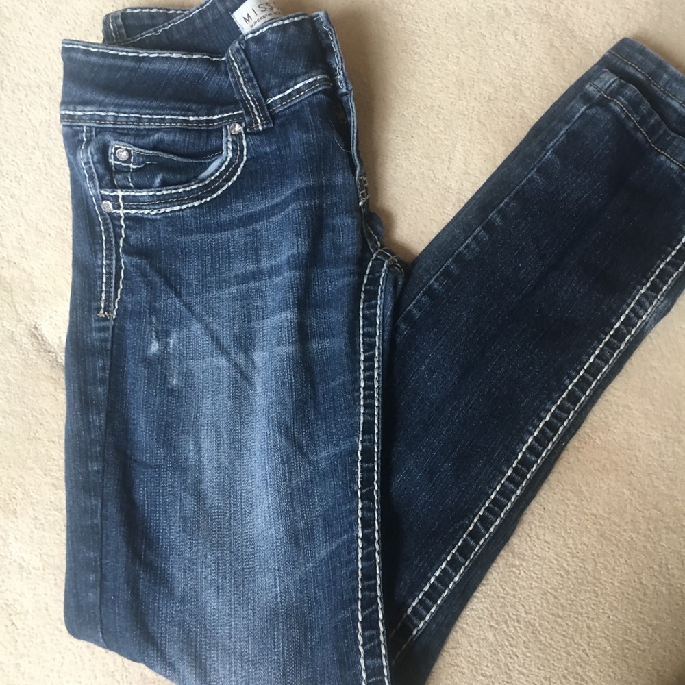 Blue jeans with white trim